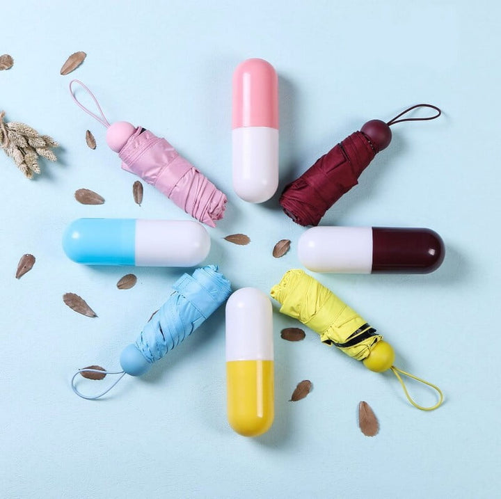 Mini Compact Capsule umbrella windproof 4 folding UV for travel and car (Multicolor)